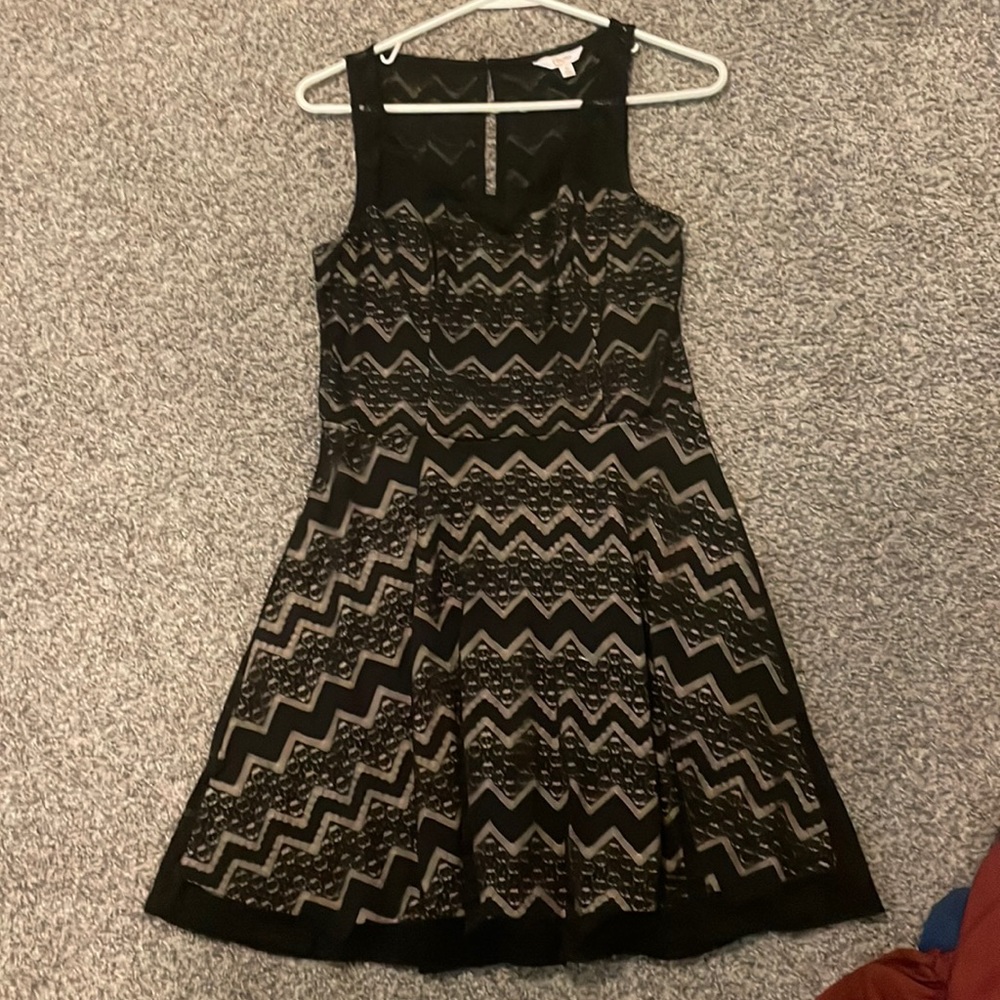 This is a chevron black Candies branded dress. Size medium.